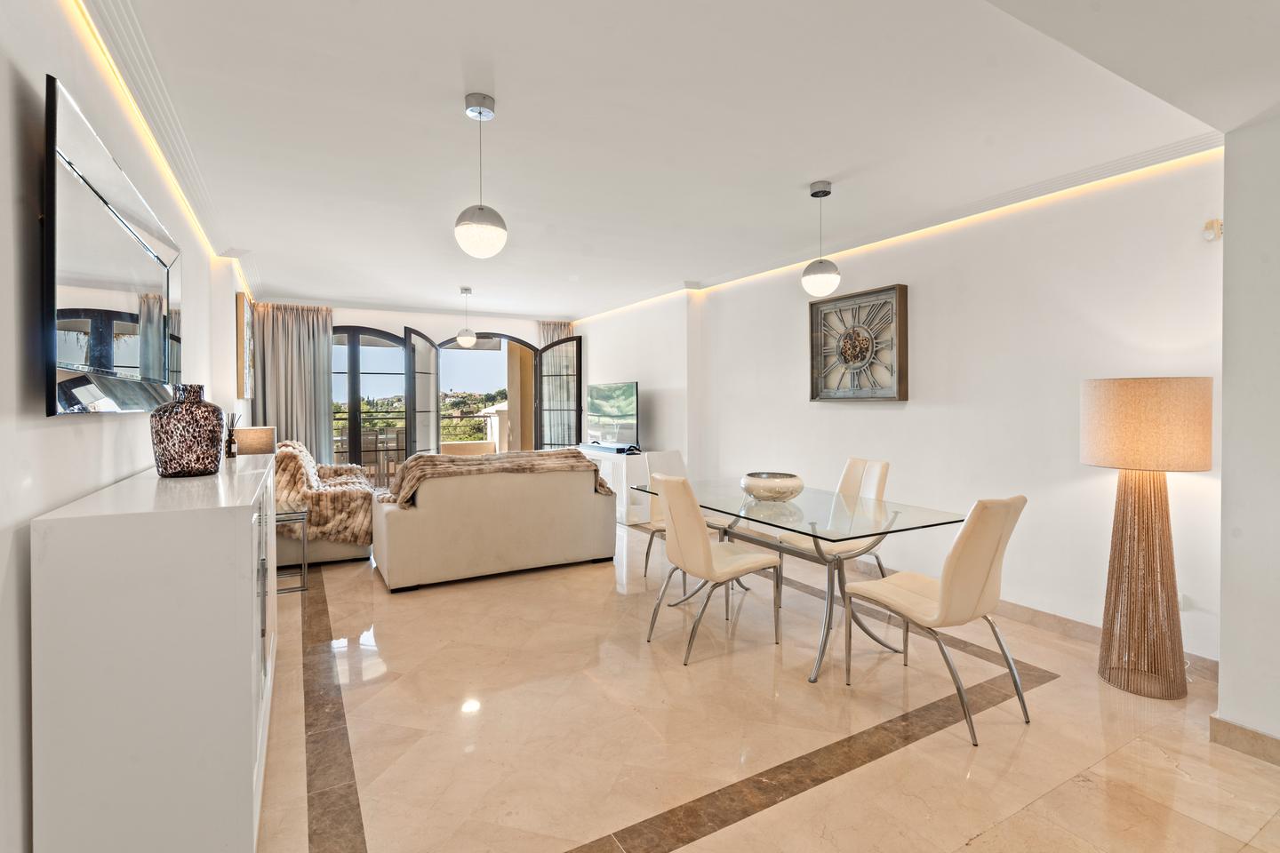 Living and dining area, Los Arqueros Golf Apartment
