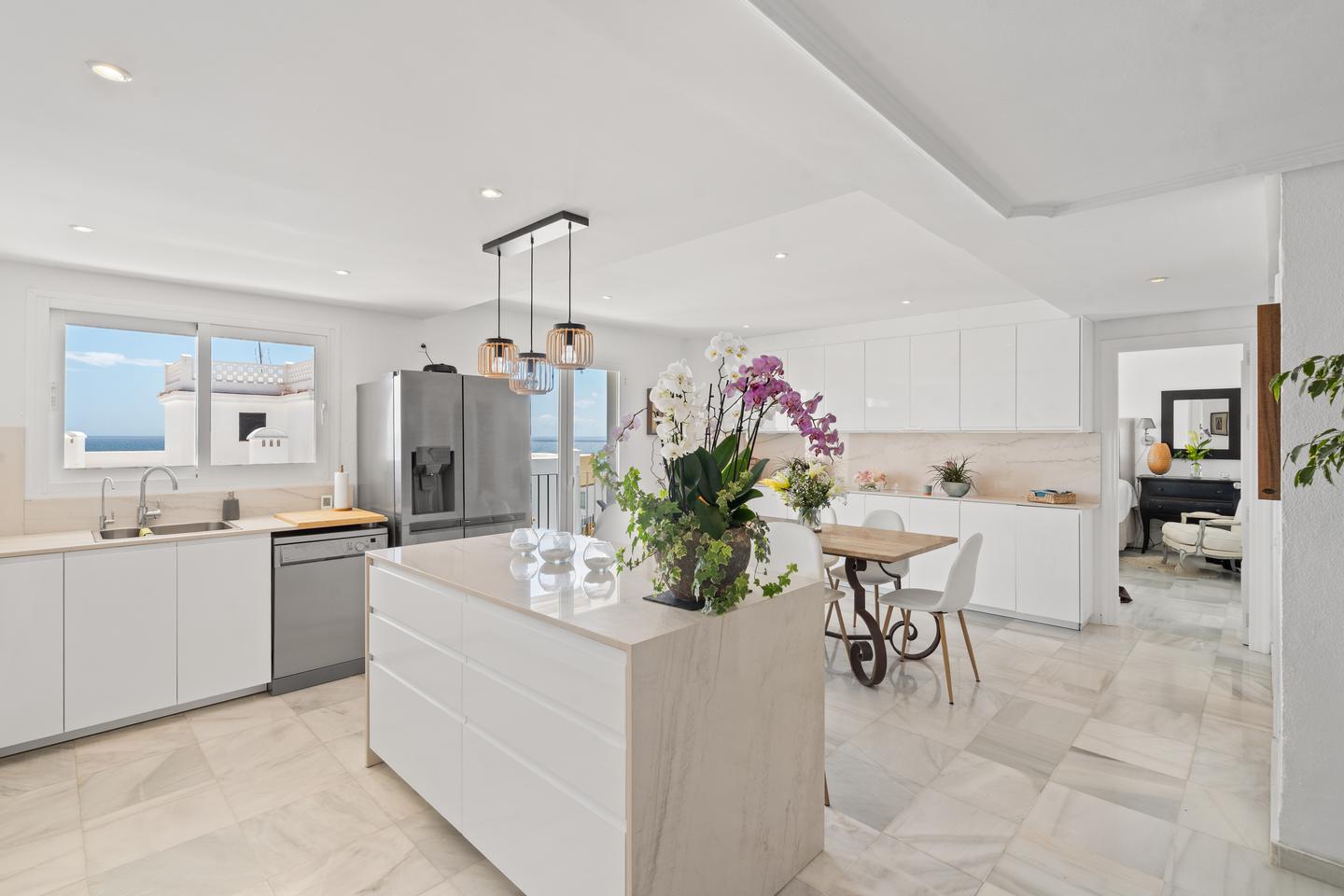 Kitchen with island, Beachfront Marbella Apartment